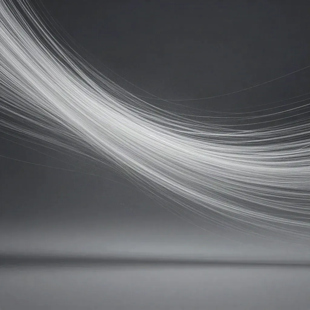 Silver light filaments converge in a soft off-centre bloom through graphite haze.